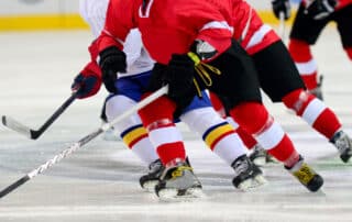 Ice hockey player on the ice. Team sport