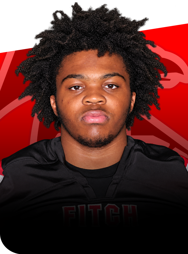Ashton Ngadjui football senior groton ct Headshot of a football player in a black jersey with "FITCH" on the chest against a red background.