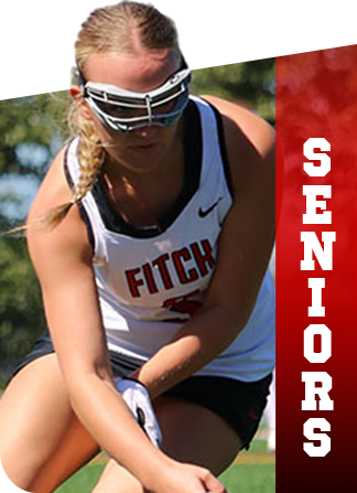 Fitch High School field hockey player wearing protective eyewear and a white jersey with the text "Seniors" on the side.