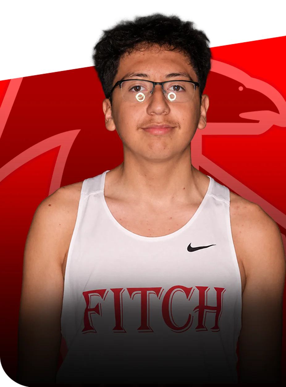 Joel-Obregon-Ferrierio Portrait of Joel Obregon Ferrierio wearing a white Fitch jersey against a red hawk mascot background.