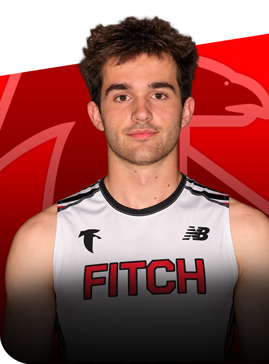 Logan-whaley Portrait of Logan Whaley wearing a white Fitch athletic jersey against a red background.