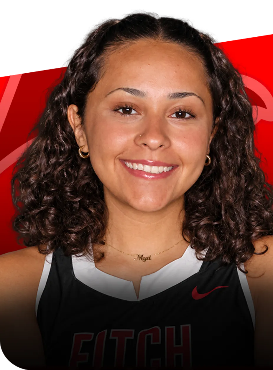 Mya-Richardson-profile-groton-ct Portrait of Mya Richardson smiling, wearing a black Fitch field hockey jersey.