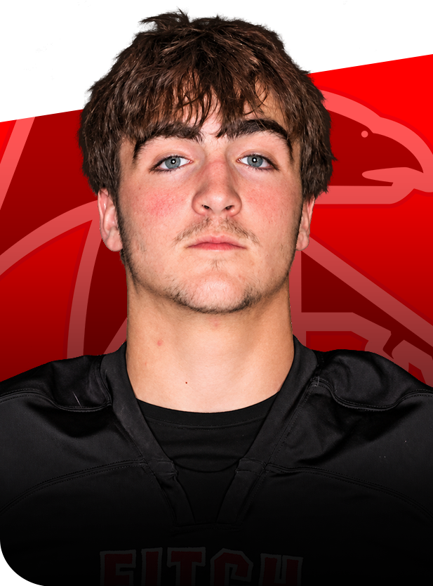 Sam Cabral football senior groton ct Portrait of high school football player Sam Cabral wearing a black Fitch jersey against a red background.