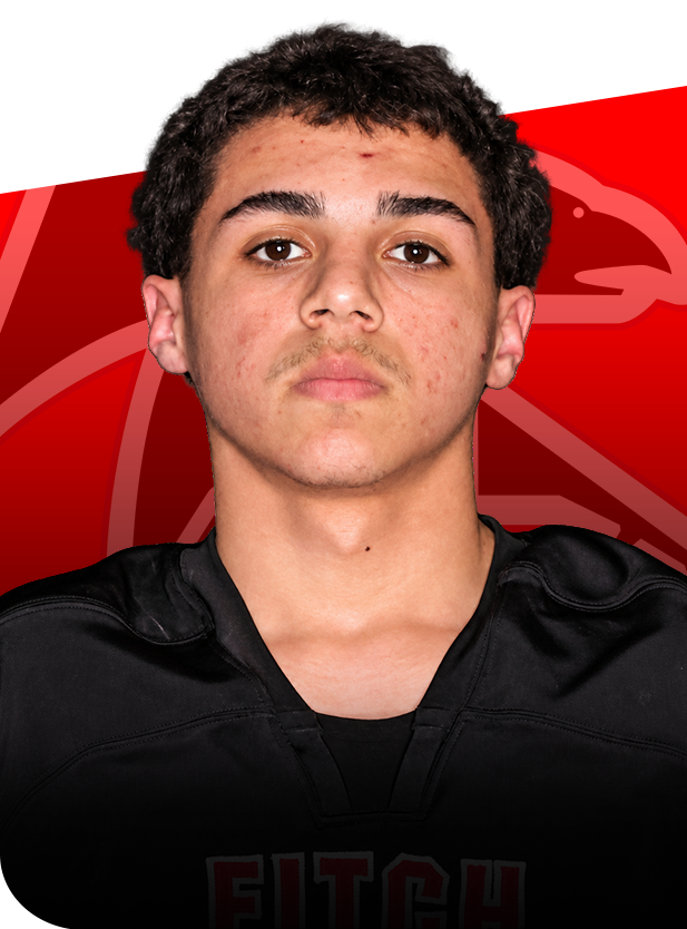 Sudan Quadir football senior groton ct Headshot of football player Sudan Qadir wearing a black jersey against a red background with a falcon logo.
