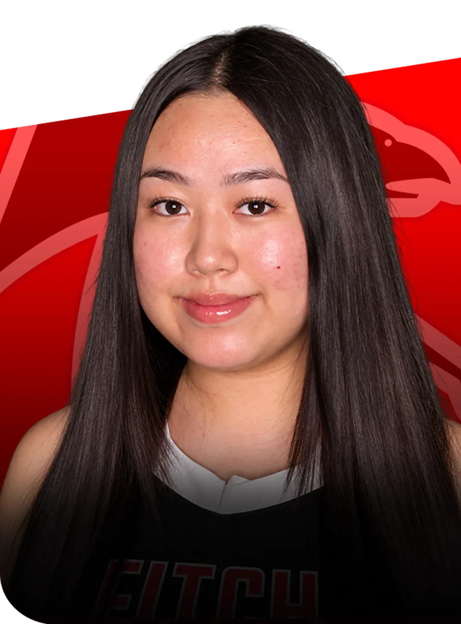 Vivian-Chen-profile-groton-ct Headshot of senior field hockey player Vivian Chen posing against a red background.