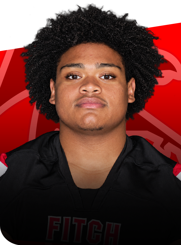 Wayne Cowell football senior groton ct Headshot of football player Wayne Cowell wearing a black team jersey against a red background.